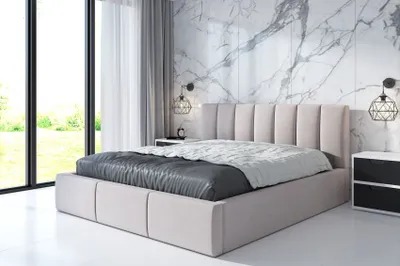 A modern bedroom with a large bed, marble accent wall, and large windows.