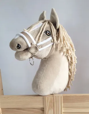 Immagine prodotto di Cavezza regolabile per cavallo Hobby Horse A3 beige con pelliccia bianca