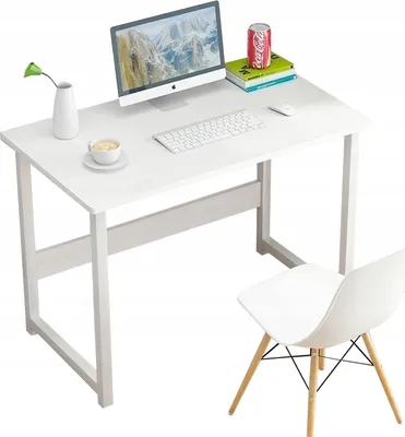 A white desk with a computer, keyboard, mouse, a cup of coffee, and a vase with a plant. A white chair is placed next to the desk.