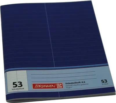 A blue notebook with lined pages and a label on the bottom.