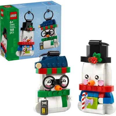 Produktbild von LEGO Deko-Schneemänner Spielzeug - Weihnachtlicher Modellbausatz mit 2 Figuren & Zubehör - Christbaumschmuck Dekoration - Geschenkidee für Mädchen und Jungen ab 6 Jahren - 40812