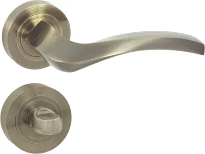 Produktbild von DOMINO Türgriff Drückergarnitur WC - Badezimmer Set | Rund-Rosette | Türbeschlag für Badezimmertüren | Set WC - Rosetten-Garnitur | Türklinke aus Aluminium | Bronze Türdrückergarnitur | ENIGMA-R M3
