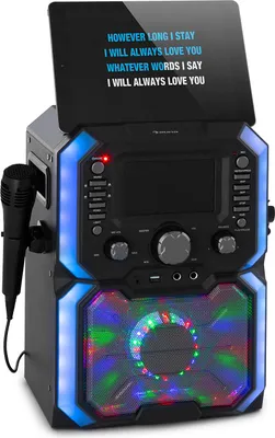 A karaoke machine with a microphone and a screen displaying lyrics.