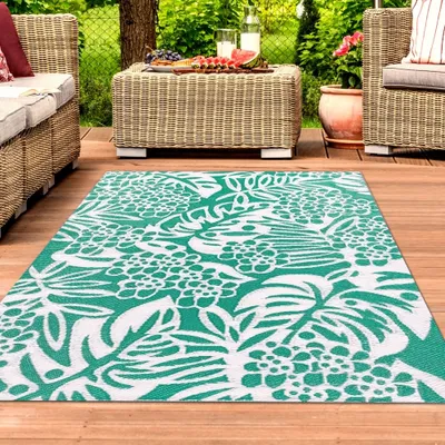 Produktbild von Outdoor-Teppich mit tropischem hauch in petrol farbe Größe - 240 x 340 cm