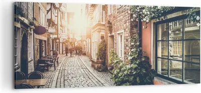 Produktbild von Bild auf Leinwand - Leinwandbild - Straße Haus Leute - 120x50cm - Wand Bild - Wanddeko - Wandbilder - Leinwanddruck - Bilder - Kunstdruck - Wanddekoration - Leinwand bilder - Wandkunst - AB120x50-3631