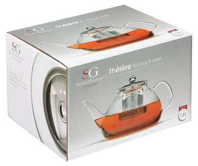 The image shows the packaging of a glass teapot with a stainless steel infuser.