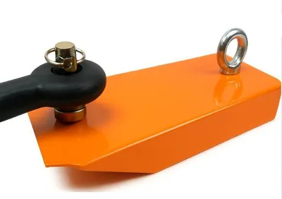 A close-up shot of an orange tow hitch adapter with a black attachment and silver hardware, isolated on a white background.