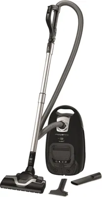A black and silver vacuum cleaner with its accessories, displayed on a white background.