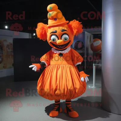 Productafbeelding van Orange Evil Clown mascotte REDBROKOLY kostuum karakter gekleed met een rok en hoofdbanden