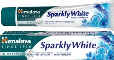 A tube and box of Himalaya Sparkly White Herbal Toothpaste.