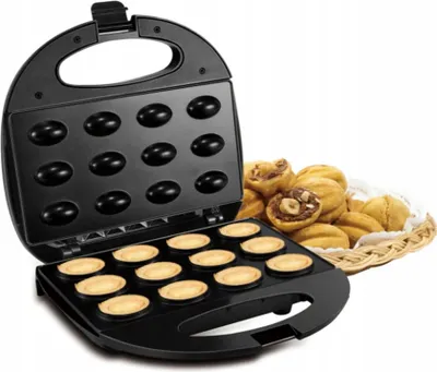 A black waffle maker with a basket of baked goods next to it.