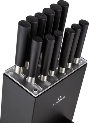 A close-up view of a knife block filled with knives.