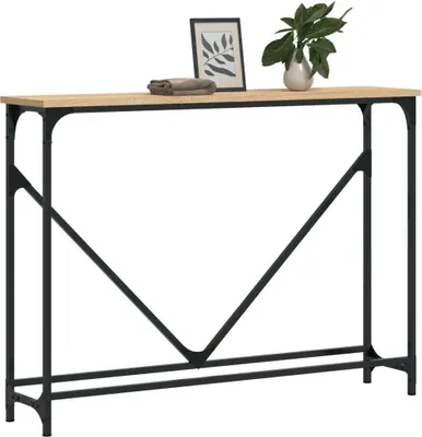 A console table with a wooden top and black metal legs, displayed against a white background. Decorative items, including a framed picture and a plant in a vase, are placed on the table.