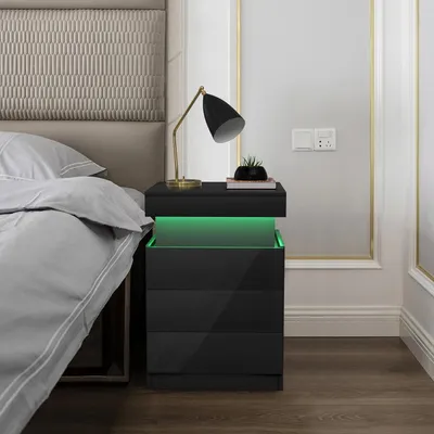 Immagine prodotto di Tavolino da notte nero lucido con 3 cassetti e ripiano, dimensioni 45x40x67 cm