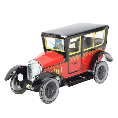 Imagen del producto de Taxis con cuerda, de color rojo, un elegante coche de juguete vintage con mecanismo de cuerda, ideal para fiestas y cumpleaños