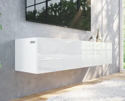 A modern living room with a wall-mounted TV lowboard.