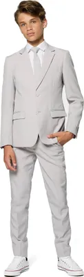 A young boy wearing a suit.