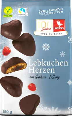 A package of chocolate-covered gingerbread hearts with raspberry filling, decorated with snowflakes.
