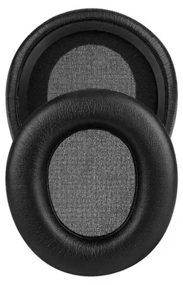 Two black ear pads for headphones are shown, stacked on top of each other.