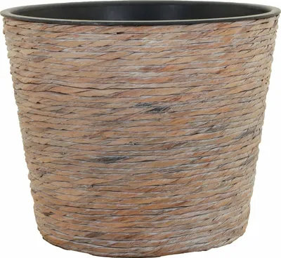 A close-up studio shot of a woven plant pot.