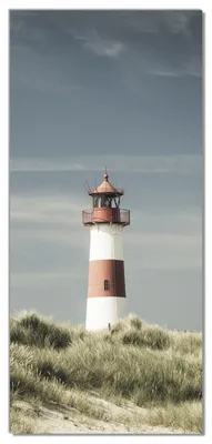 Produktbild von Wallario selbstklebende Türtapete 100 x 220 cm mit Schutzlaminat - Leuchtturm auf der Düne am Strand