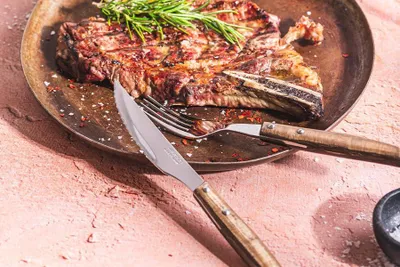 Produktbild von Famanu Steakmessenset 12-teilig (6 Messer + 6 Gabeln) - Edelstahl mit Griff aus Pakka-Holz in Braun