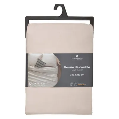 A beige duvet cover folded and packaged with a hanger and label.