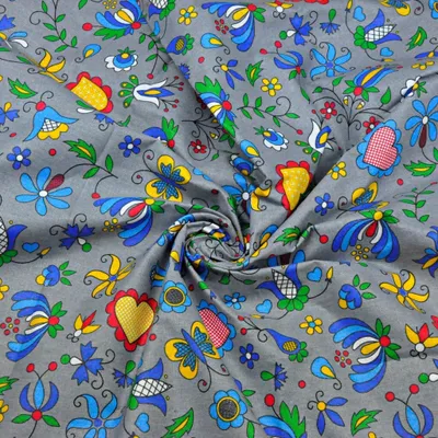 Produktbild von Baumwolle 100% Kaschubisches Muster blau auf grauem Hintergrund
