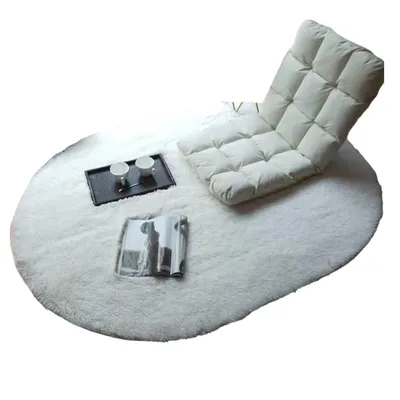 A white fluffy rug with a floor chair, a tray with two cups, and a magazine on it.