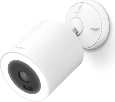 A white Hama WLAN surveillance camera with a light ring around the lens, mounted on a white wall bracket.