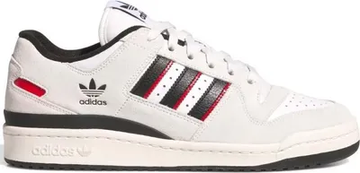 A studio shot of a single Adidas sneaker.