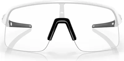 A studio shot of a pair of white and clear Oakley Sutro Lite sunglasses against a white background.