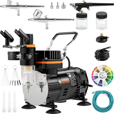 A collection of airbrushing equipment, including an air compressor, multiple airbrushes, hoses, and accessories, arranged on a white background.