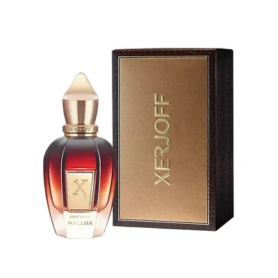 A perfume bottle and its box are displayed against a white background.
