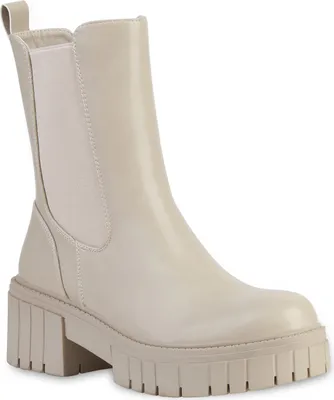 A single beige boot on a white background.