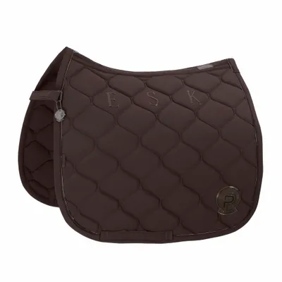 A brown dressage saddle pad with a diamond pattern and embroidered letters.