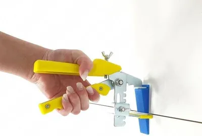 Produktbild von Zange Gelb für Wandfliesen Fliesen Nivelliersystem Verlegesystem Fliesenverlegung Fliesenverlegehilfe Fliesenverlegesystem Fliesennivelliersystem