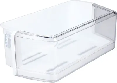 A clear plastic refrigerator door bin with a white insert on the left side.