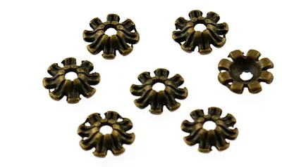 Produktbild von Vintageparts 20 Perlkappen vintage Bronze Blume, 8 mm