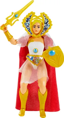 A studio shot of a She-Ra action figure holding a sword and shield.