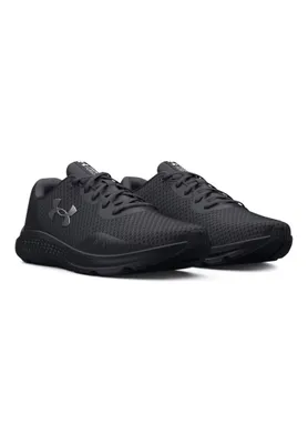 A pair of black Under Armour sneakers shown from a slightly elevated side angle.
