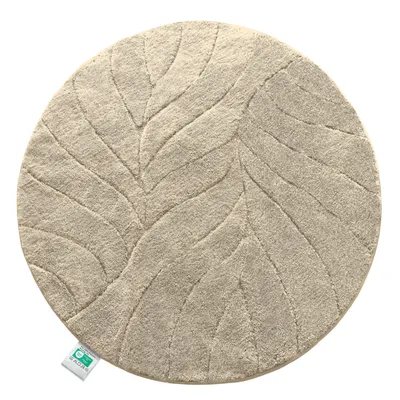 A round, beige bath mat with a leaf pattern, shown from a top-down perspective on a white background.