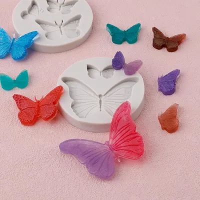 Produktbild von Schmetterling Silikonformen - Set von 4 - Flexible Schmetterling Fondantform - Schmetterlingsförmige Süßigkeiten Schokoladenformen für DIY Basteln - Hochzeitsfeier Tortenbacken Dekoration