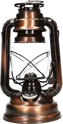 A close-up, front-facing studio shot of a bronze oil lantern with a clear glass globe.
