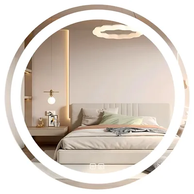 A bedroom scene with a bed and a round mirror with LED lighting.
