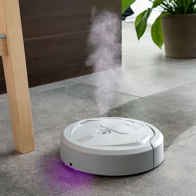 Produktbild von 4-in-1 Wisch-Roboter, wiederaufladbar, mit UV-Desinfektion, Luftbefeuchter- und Lufterfrischer-Funktion Klinbot InnovaGoods