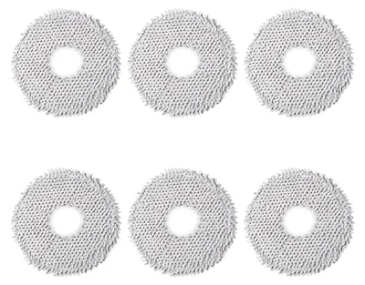 Six circular cleaning pads arranged in two rows of three.
