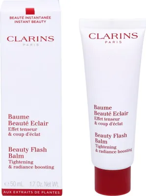 A product shot of a Clarins Beauty Flash Balm tube and its box, displayed side-by-side against a white background.
