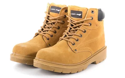 A pair of beige-brown suede work boots.