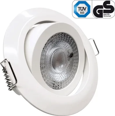 A white, swiveling LED recessed spotlight is shown against a white background. Two certification logos are visible in the upper right corner.